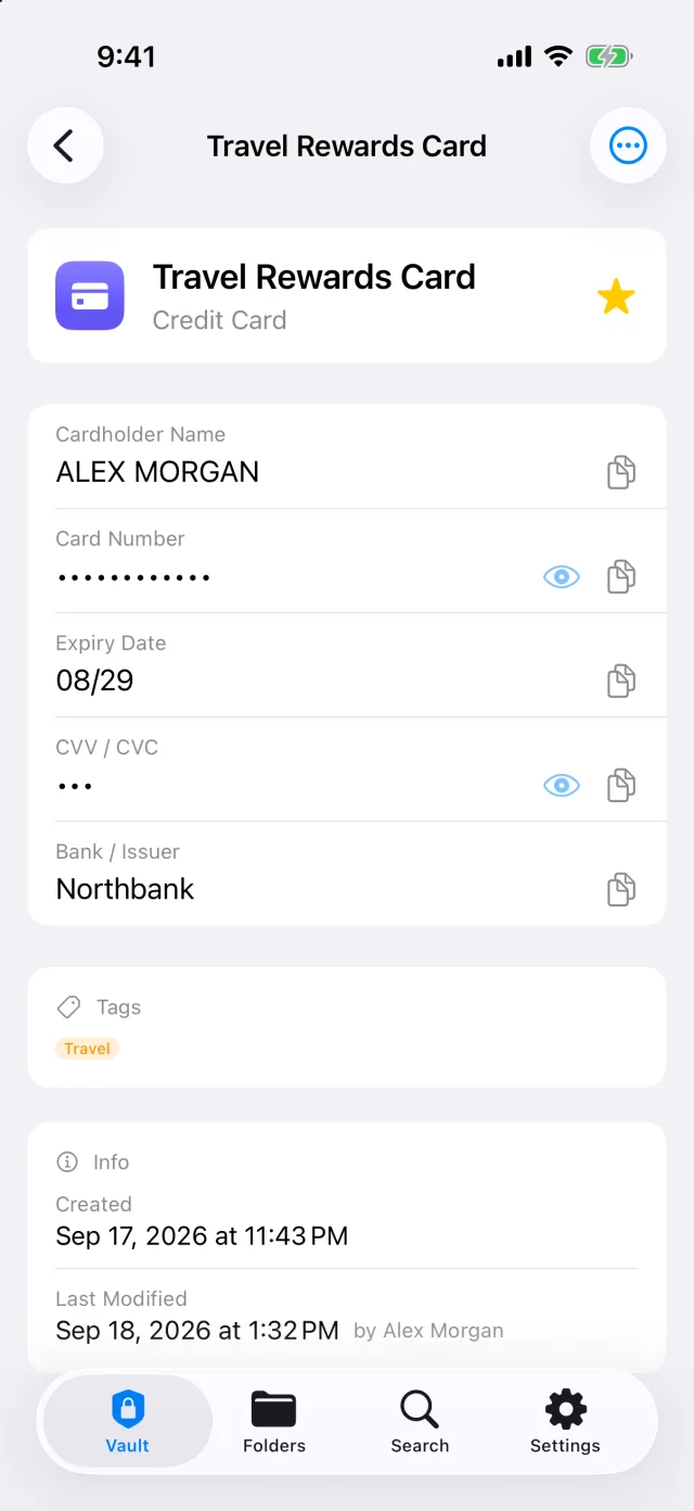 A credit card item showing the cardholder name, a masked card number, an 08/29 expiry date, a masked security code and the issuing bank.